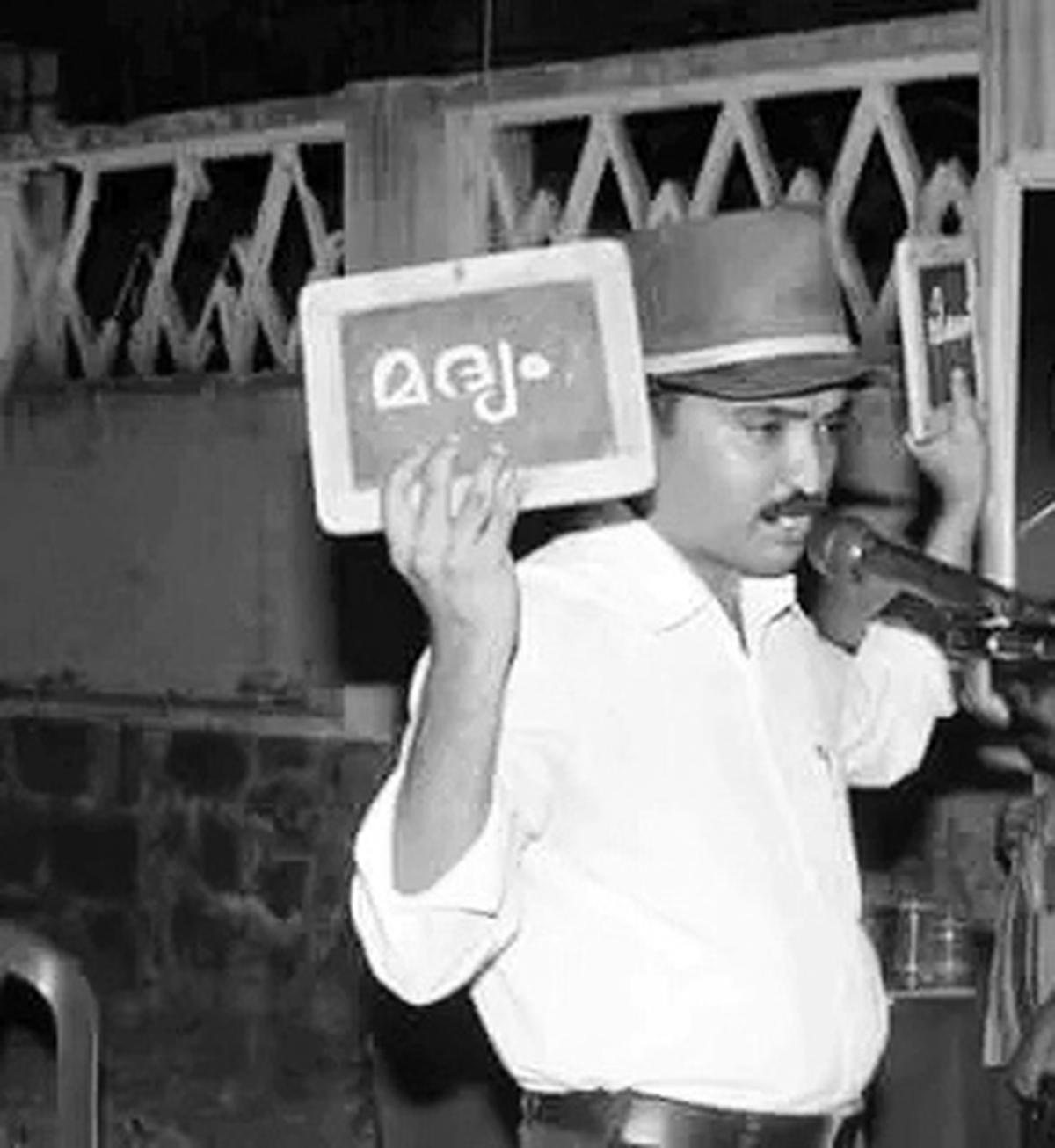 Malayil Hamsa beginning his magic campaign against drugs at Malappuram in 1995. A file photo.
